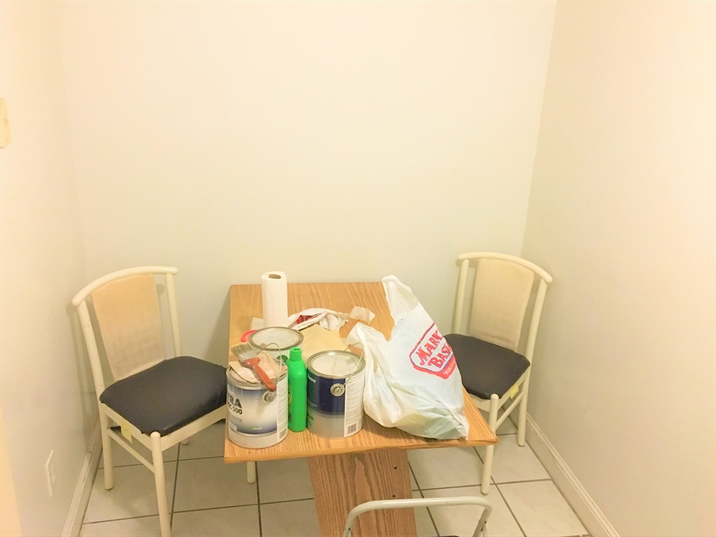 391 Langley Road, Unit 2 Newton, MA 02459 - Photo 5 of 12 a bathroom with a toilet and a sink