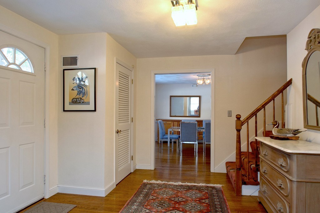73 Austin Road Sudbury, MA 01776 - Photo 2 of 26 a view of a livingroom with furniture and toys