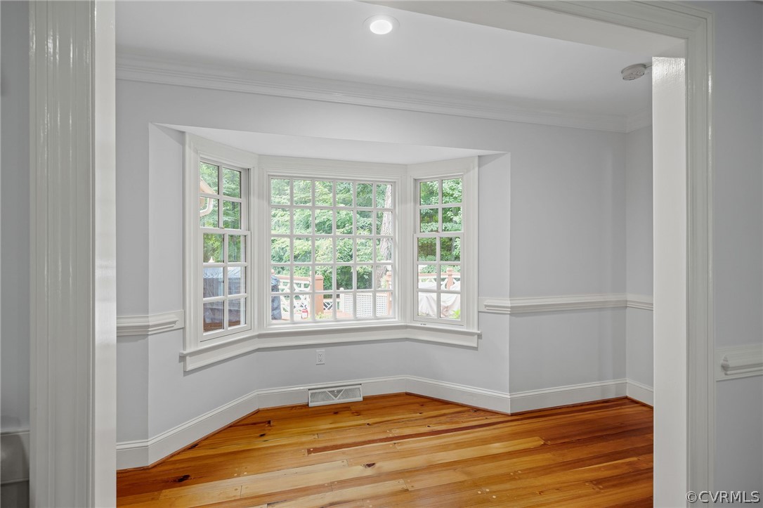 3981 Reeds Landing Circle Midlothian, VA 23113 - Photo 24 of 49 a view of an empty room with wooden floor and a window