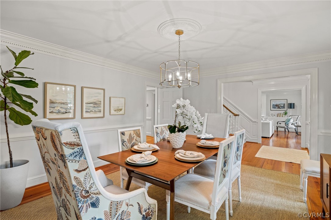 3981 Reeds Landing Circle Midlothian, VA 23113 - Photo 4 of 49 a view of a dining room with furniture and wooden floor