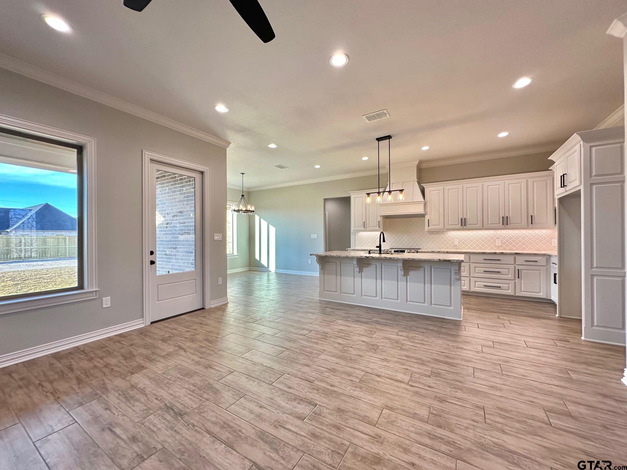 191 Brooks Drive Gladewater, TX 75647 - Photo 11 of 45 a large space with kitchen view and a window