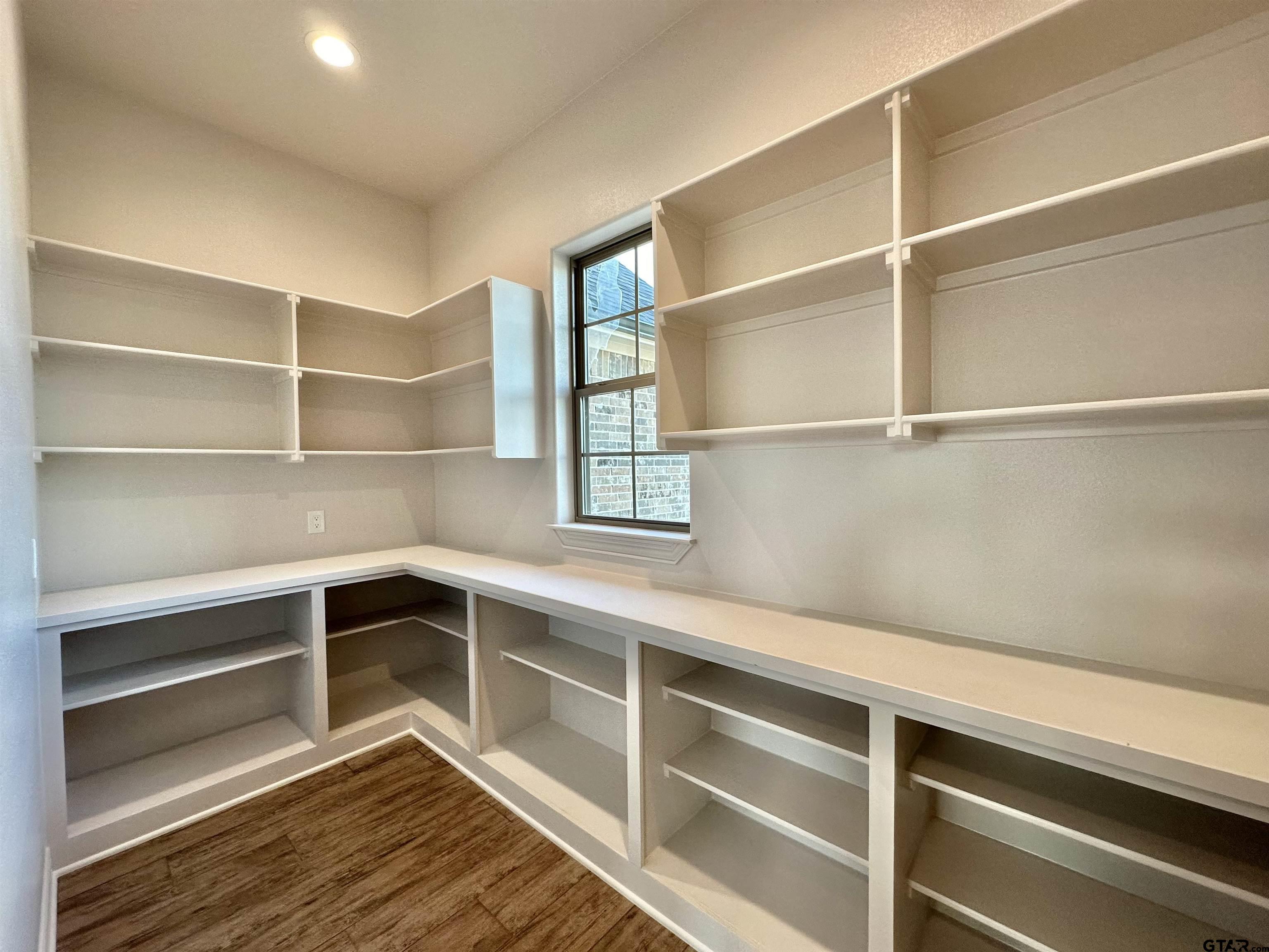 191 Brooks Drive Gladewater, TX 75647 - Photo 21 of 45 a view of an empty walk in closet