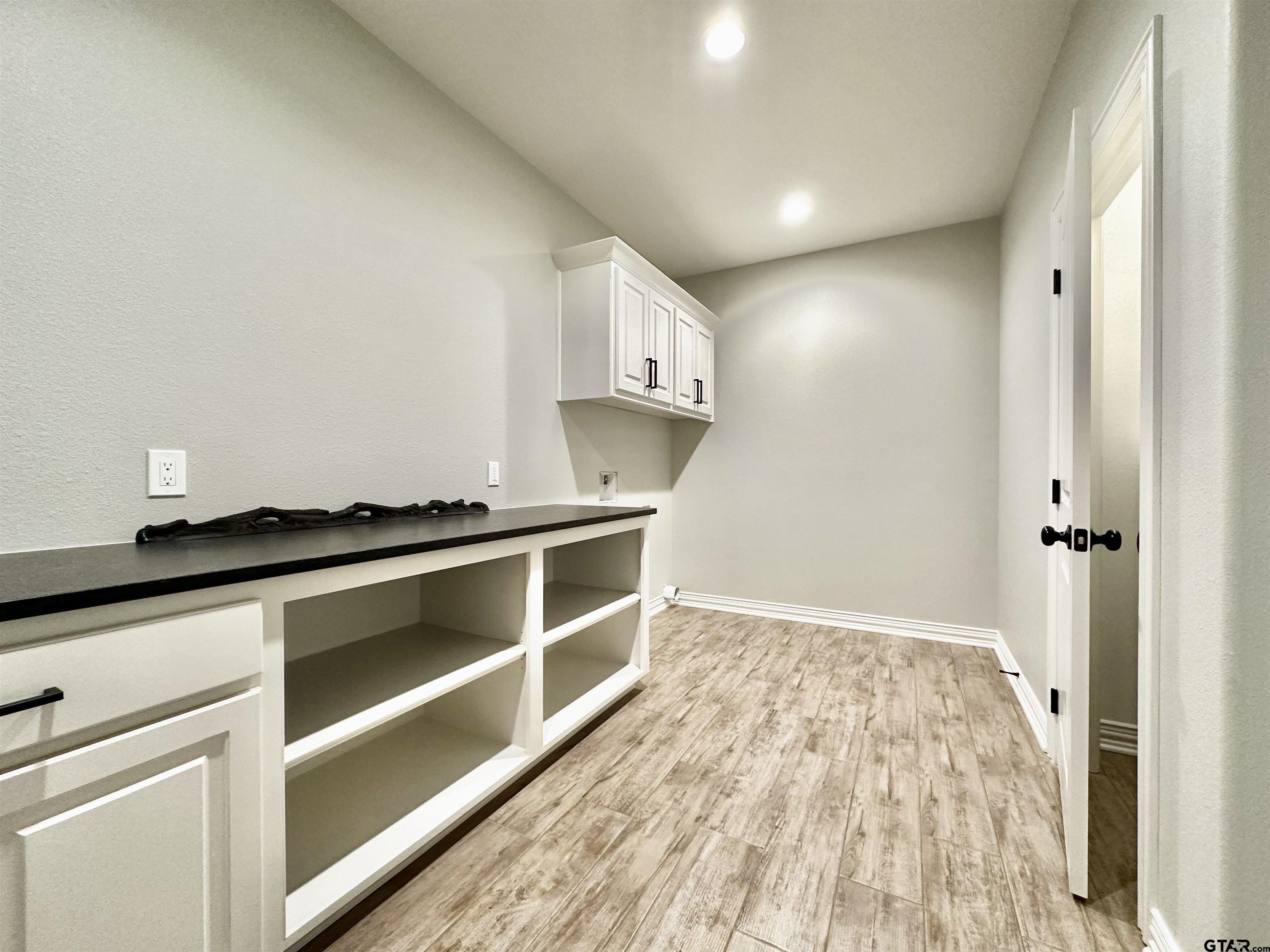 191 Brooks Drive Gladewater, TX 75647 - Photo 23 of 45 a view of an empty walk in closet