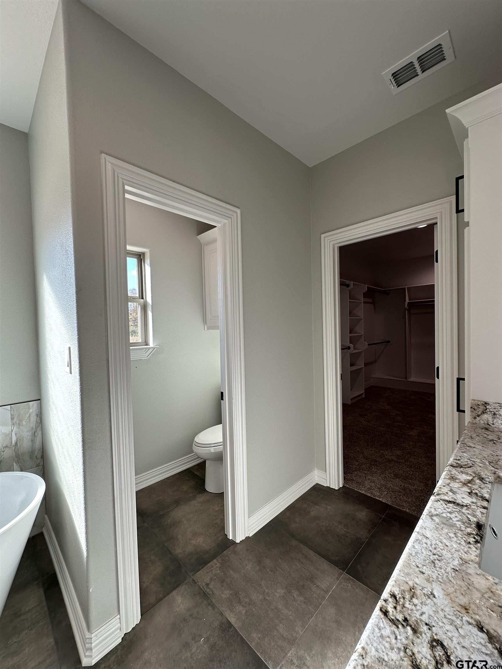 191 Brooks Drive Gladewater, TX 75647 - Photo 30 of 45 a view of a bedroom from a hallway