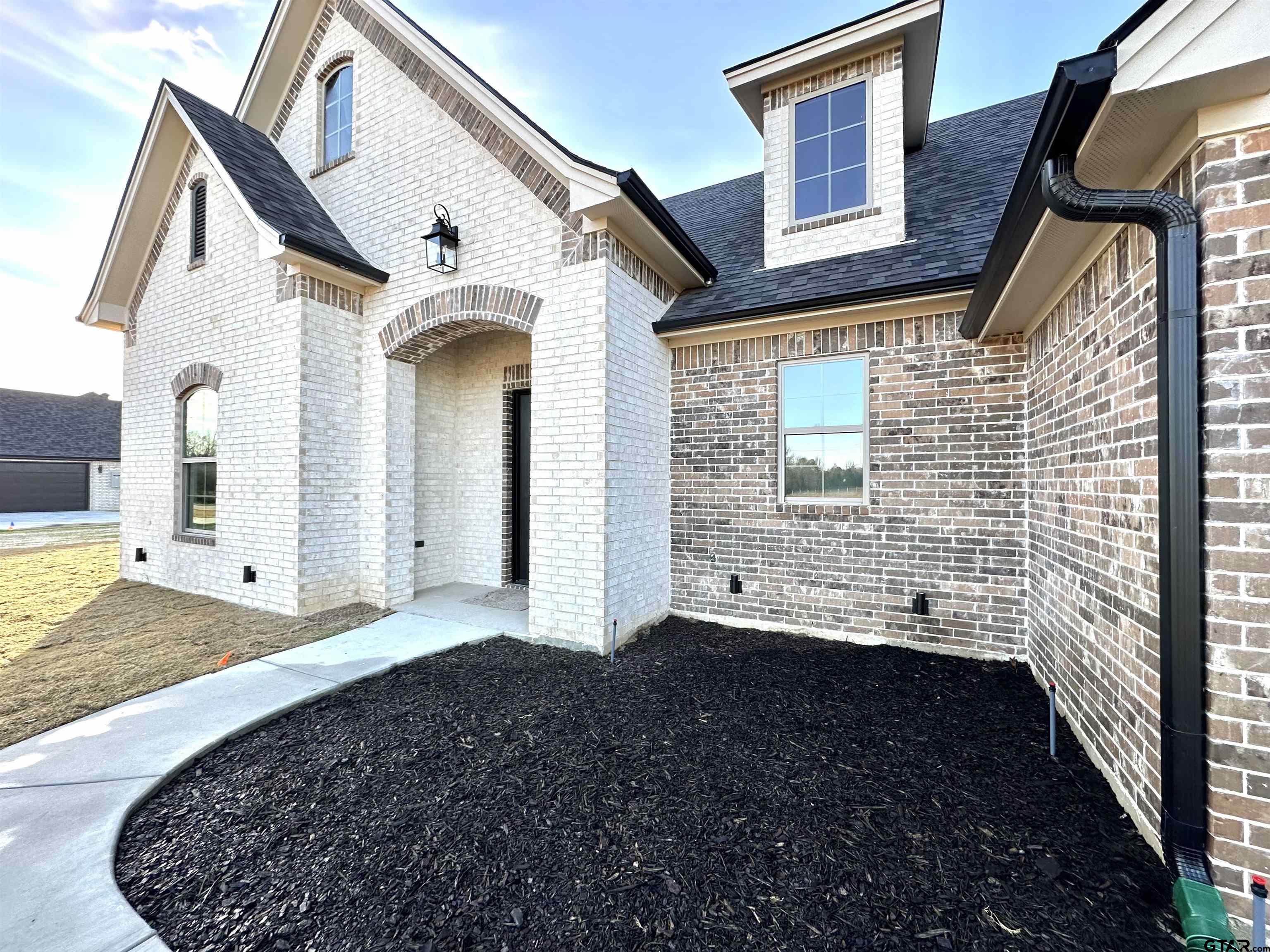 191 Brooks Drive Gladewater, TX 75647 - Photo 3 of 45 a view of a house with a yard