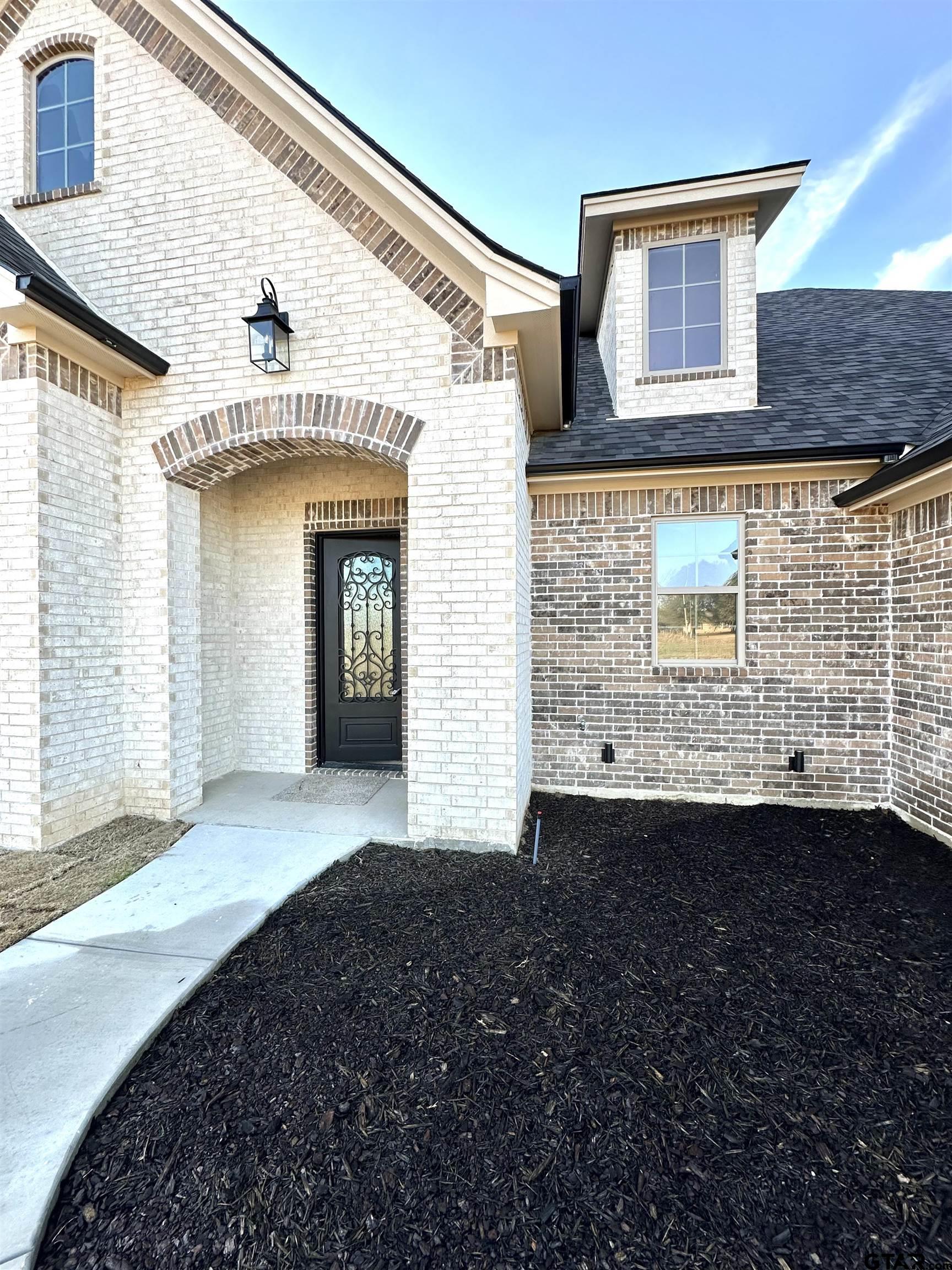 191 Brooks Drive Gladewater, TX 75647 - Photo 4 of 45 a view of a back yard of the house