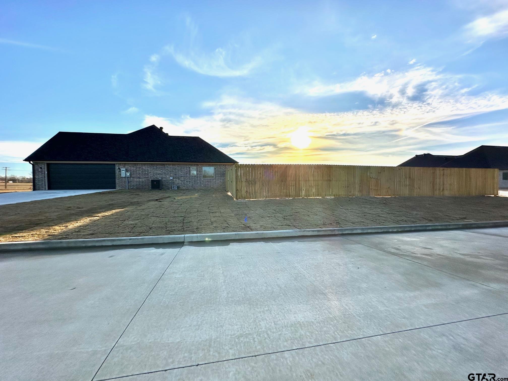 191 Brooks Drive Gladewater, TX 75647 - Photo 44 of 45 a view of a yard with an outdoor space