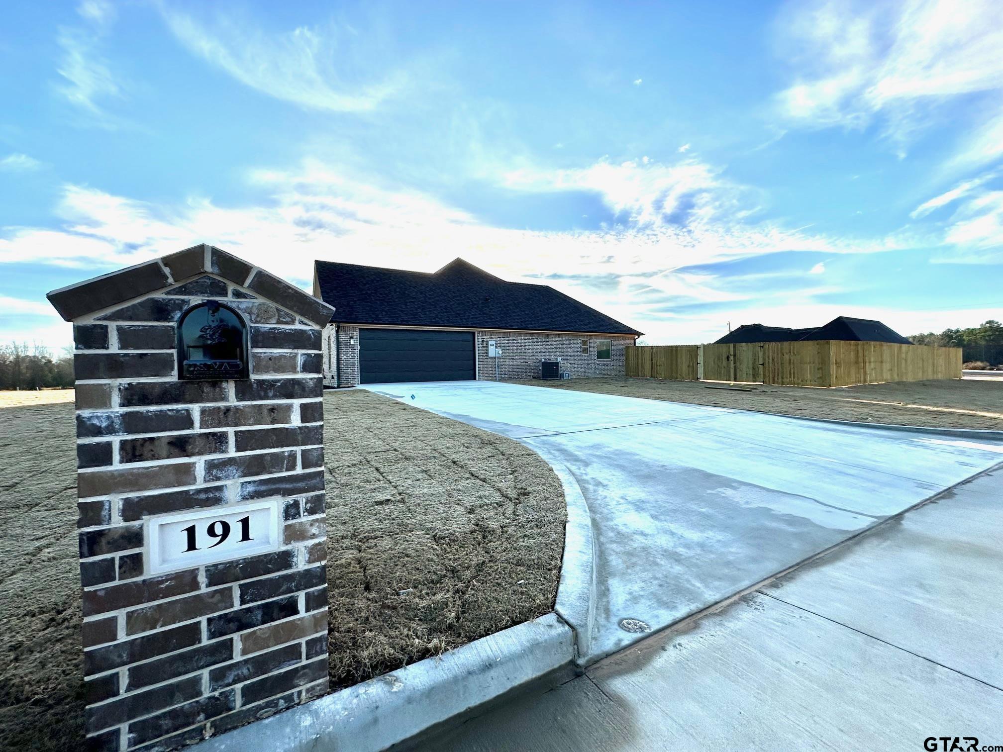 191 Brooks Drive Gladewater, TX 75647 - Photo 45 of 45 a view of a house with a yard