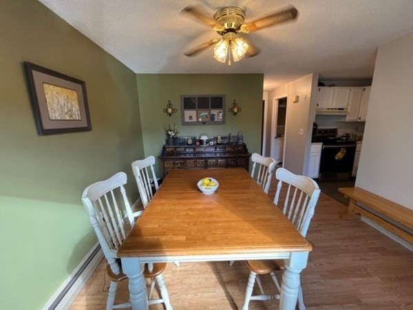 170 Ayer Road, Unit B2 Shirley, MA 01464 - Photo 3 of 28 a view of a dining room with furniture