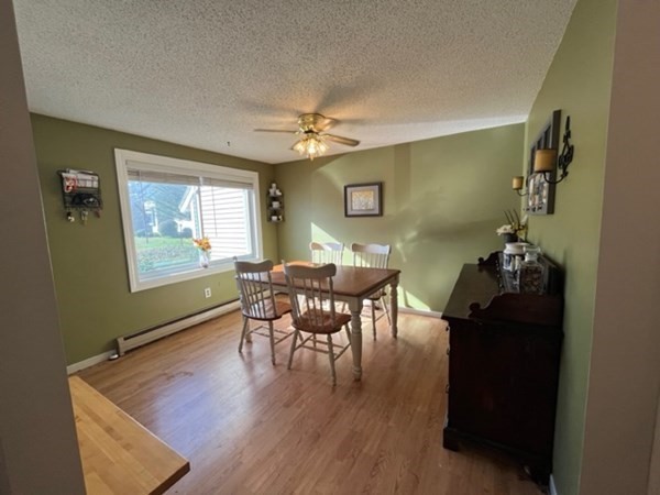 170 Ayer Road, Unit B2 Shirley, MA 01464 - Photo 5 of 28 a dining room with furniture and window