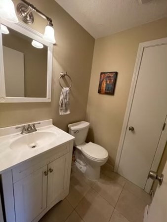 170 Ayer Road, Unit B2 Shirley, MA 01464 - Photo 8 of 28 a bathroom with a sink toilet and mirror