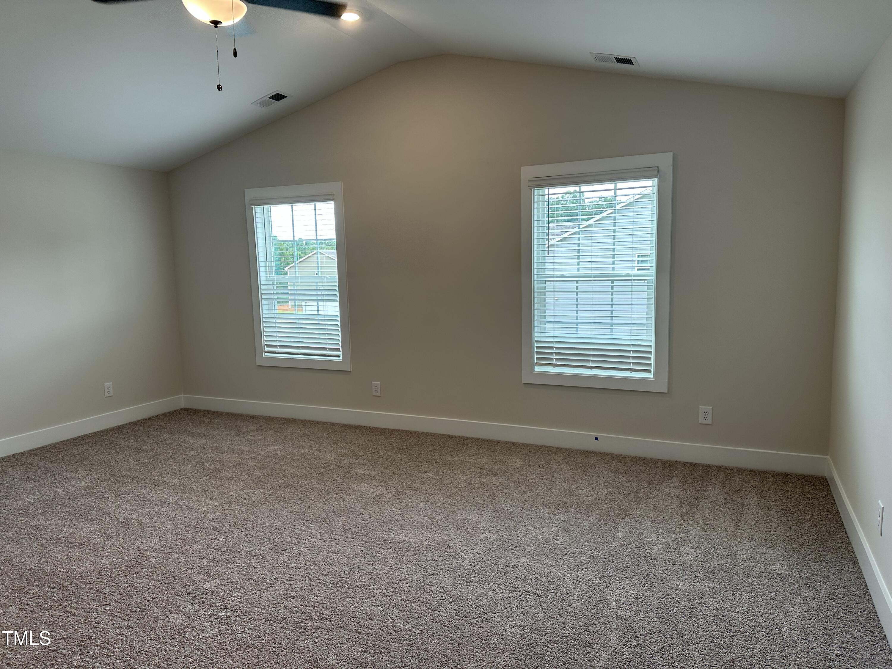 306 Shiloh Way Mebane, NC 27302 - Photo 13 of 33 an empty room with a window