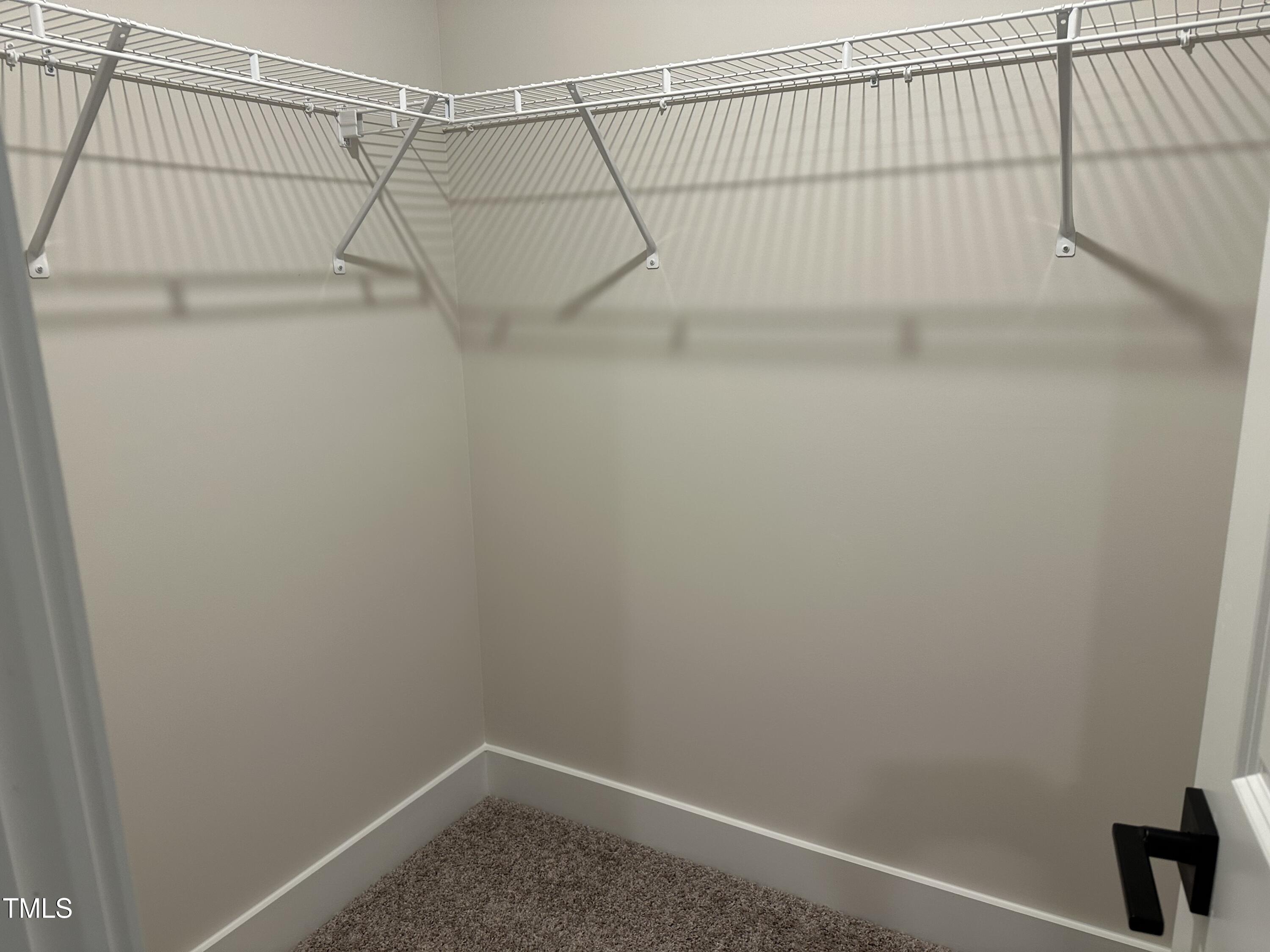306 Shiloh Way Mebane, NC 27302 - Photo 22 of 33 a view of a room with racks on the wall