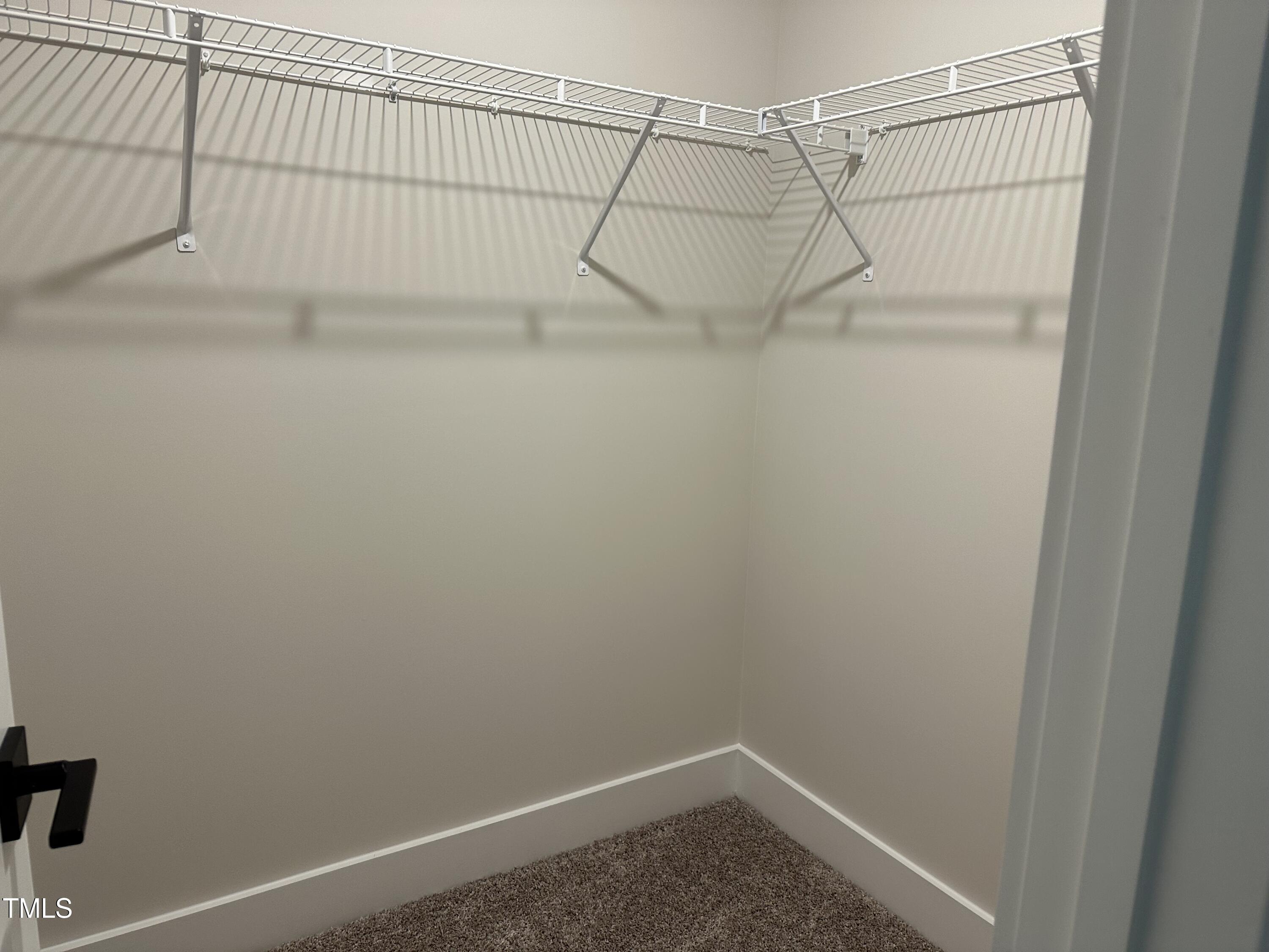 306 Shiloh Way Mebane, NC 27302 - Photo 23 of 33 a view of a room with racks on the wall