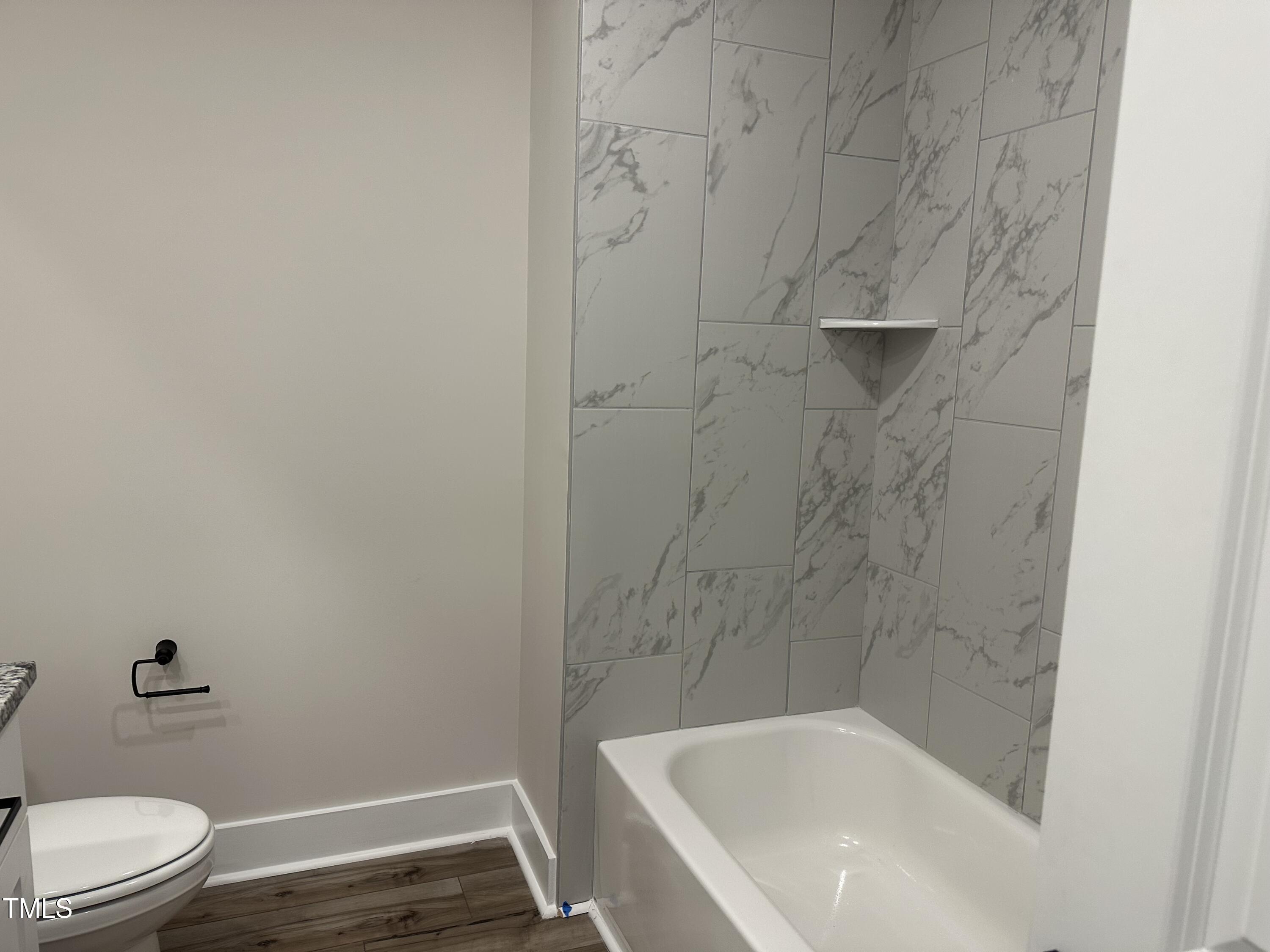 306 Shiloh Way Mebane, NC 27302 - Photo 26 of 33 a bathroom with a sink and toilet