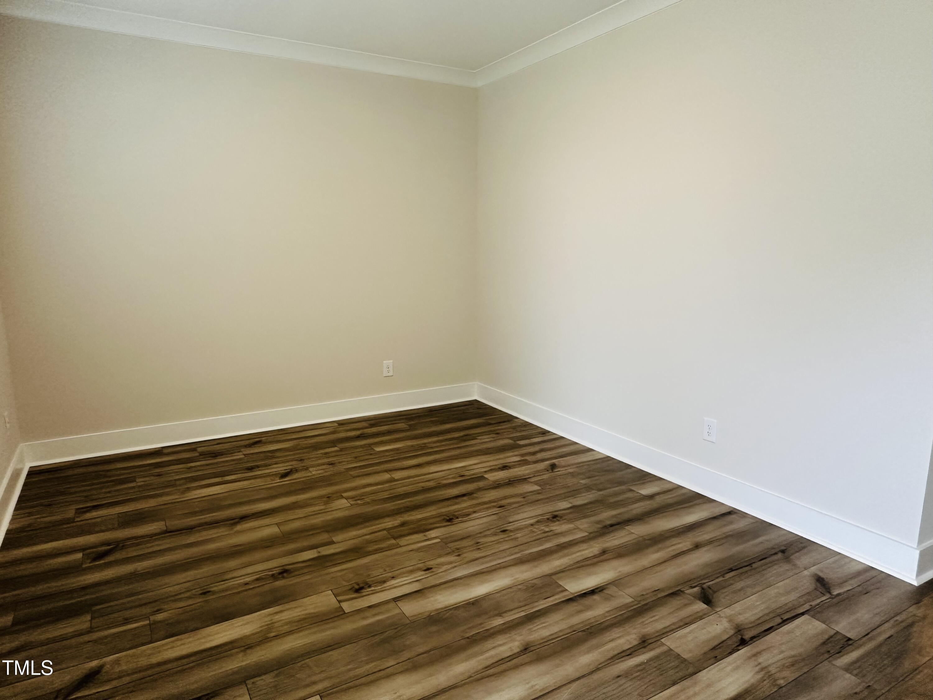 306 Shiloh Way Mebane, NC 27302 - Photo 6 of 33 a view of a room with wooden floor and white walls