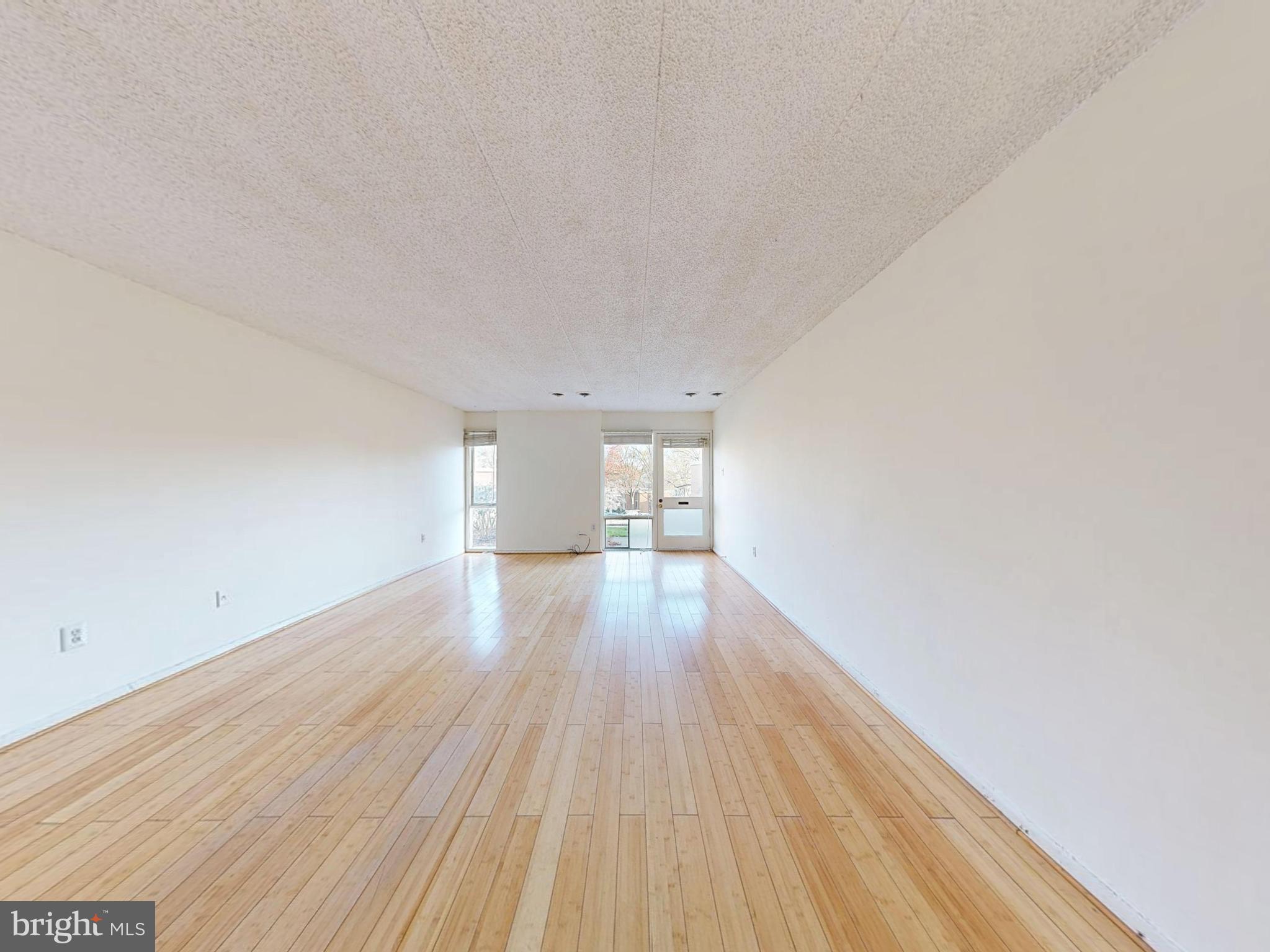 2629 Fort Farnsworth Road, Unit 276 Alexandria, VA 22303 - Photo 11 of 37 a view of empty room with wooden floor