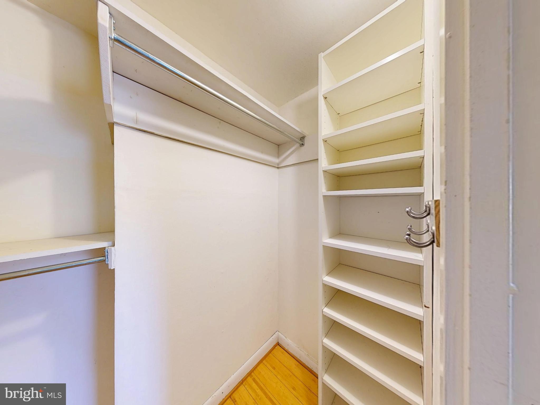 2629 Fort Farnsworth Road, Unit 276 Alexandria, VA 22303 - Photo 13 of 37 a view of walk in closet with empty racks