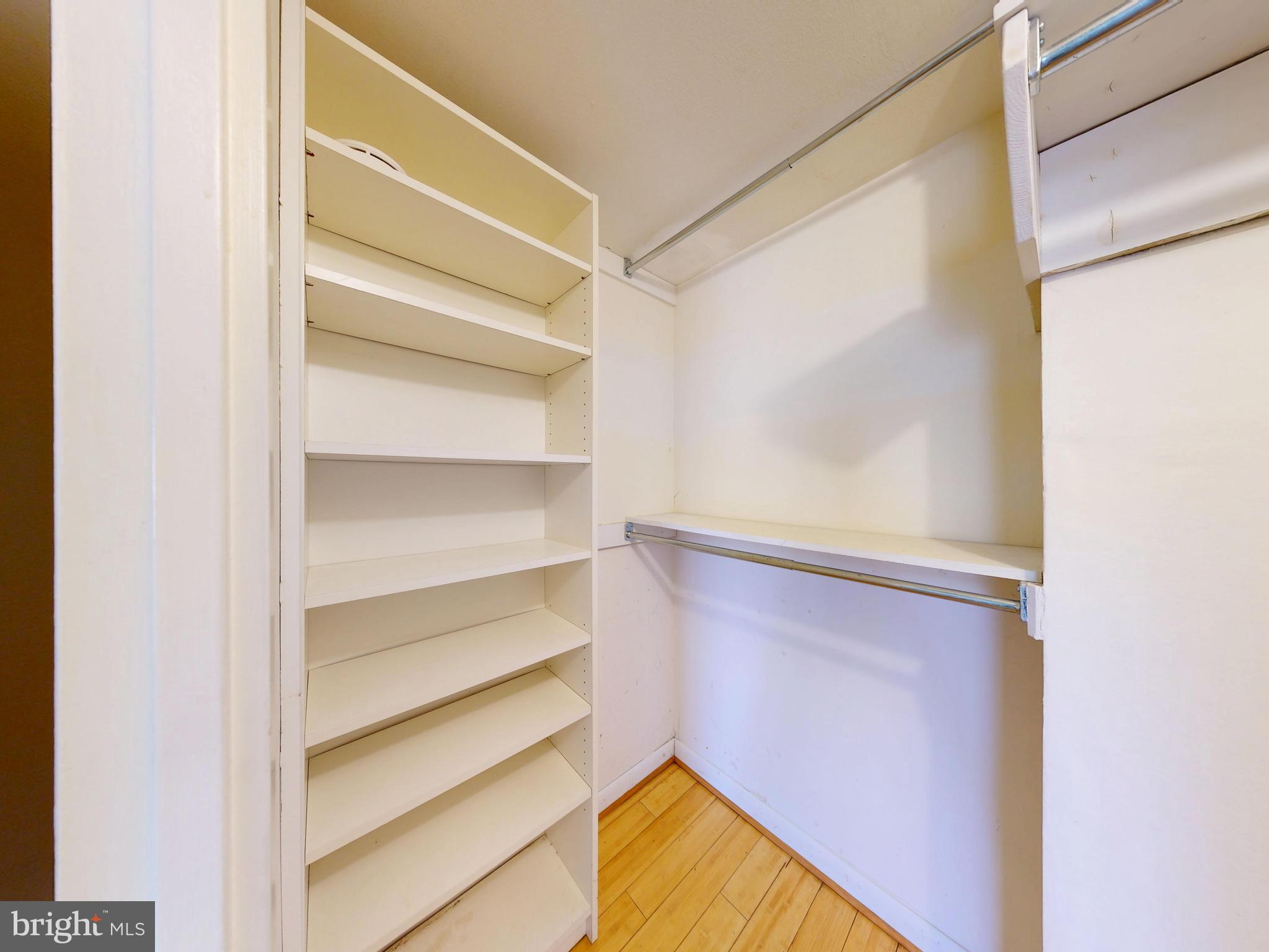 2629 Fort Farnsworth Road, Unit 276 Alexandria, VA 22303 - Photo 14 of 37 a view of walk in closet with empty racks