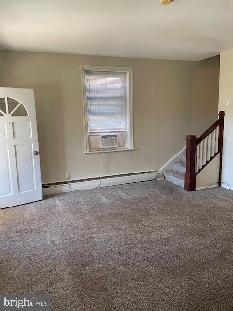 309 North Stratton Street Gettysburg, PA 17325 - Photo 4 of 18 an empty room with windows and stairs