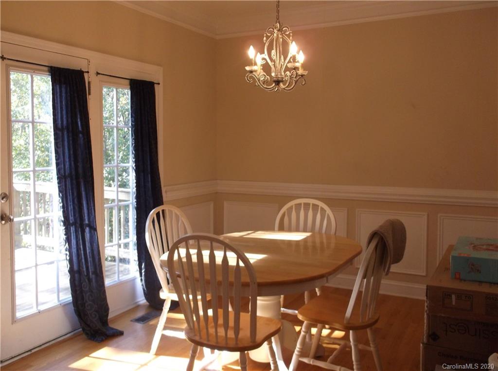 12450 Banks Road Mount Pleasant, NC 28124 - Photo 12 of 43 a view of a dining room with furniture window and outside view
