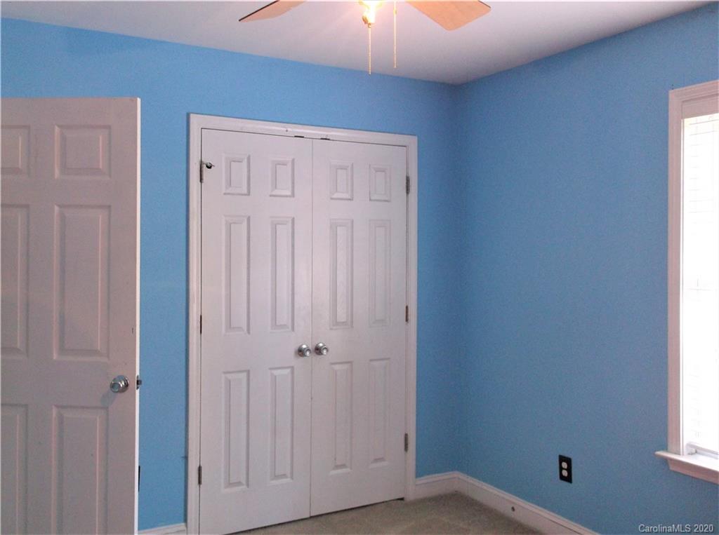 12450 Banks Road Mount Pleasant, NC 28124 - Photo 26 of 43 an empty room with a window