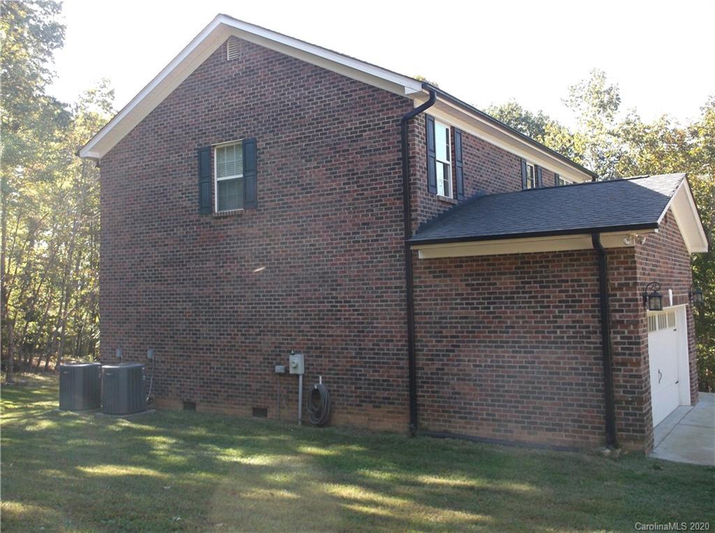 12450 Banks Road Mount Pleasant, NC 28124 - Photo 4 of 43 a backyard of a house