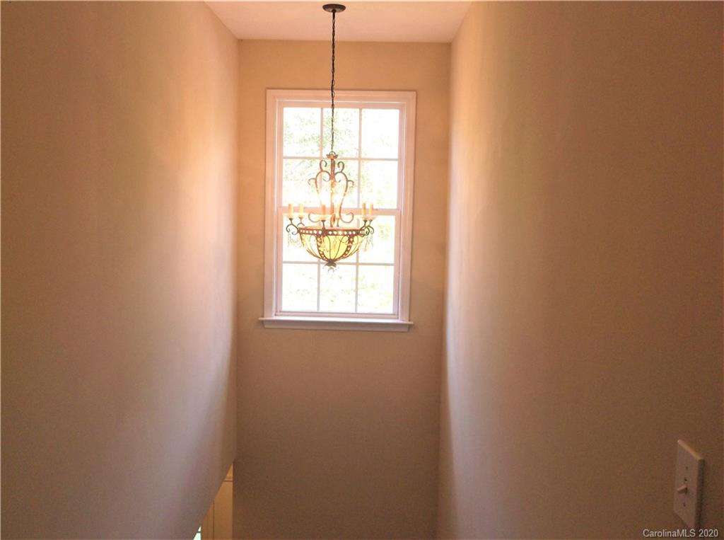 12450 Banks Road Mount Pleasant, NC 28124 - Photo 37 of 43 a view of an empty room with a window