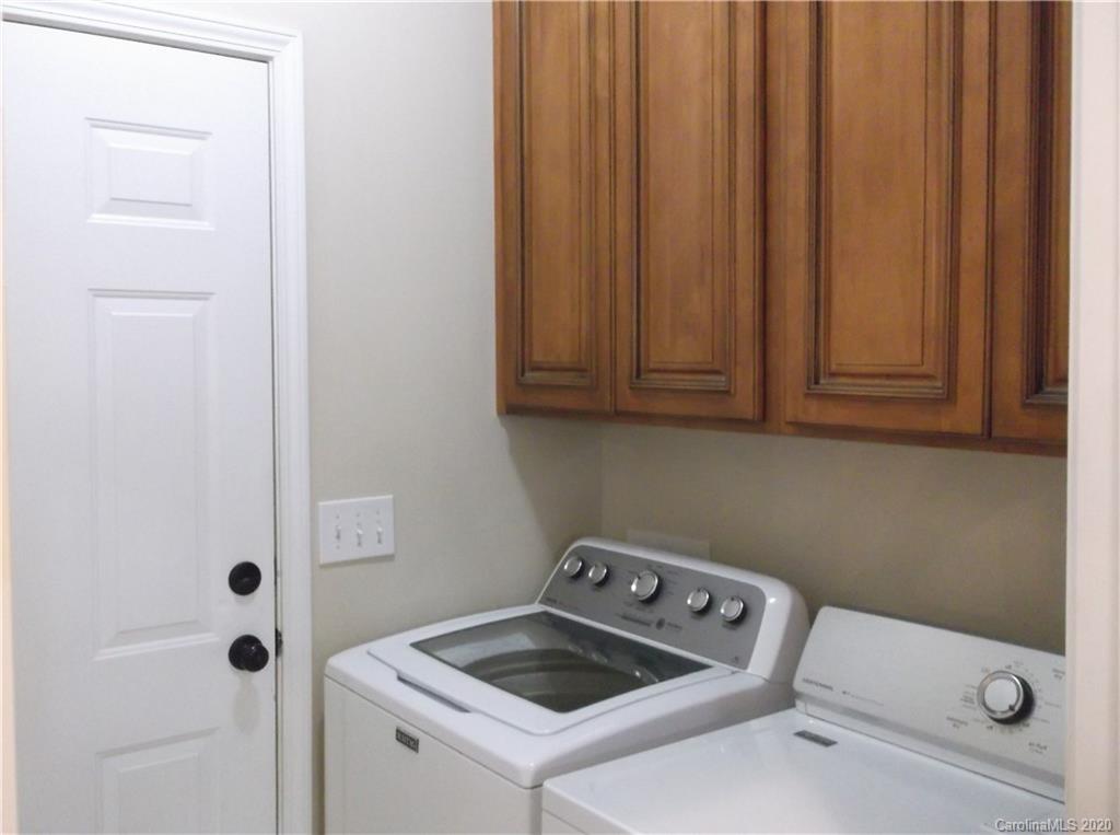 12450 Banks Road Mount Pleasant, NC 28124 - Photo 40 of 43 a utility room with dryer and washer
