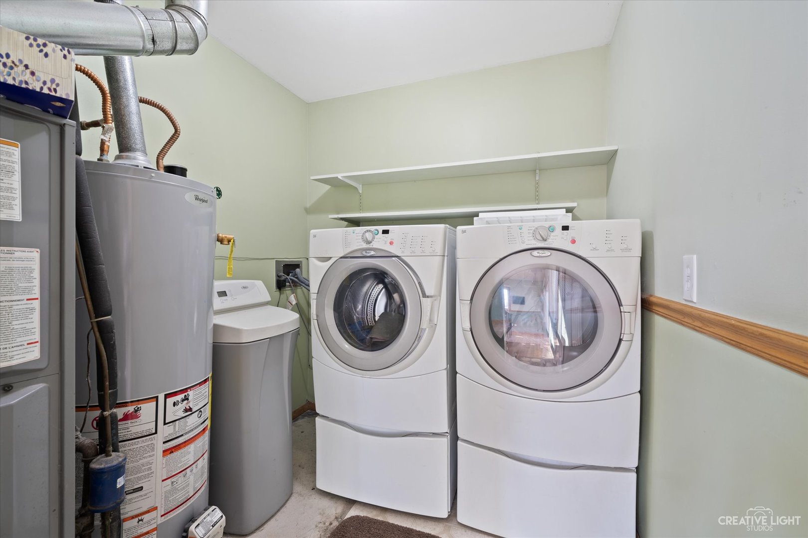 135 Heathgate Road Montgomery, IL 60538 - Photo 13 of 17 a utility room with dryer and washer
