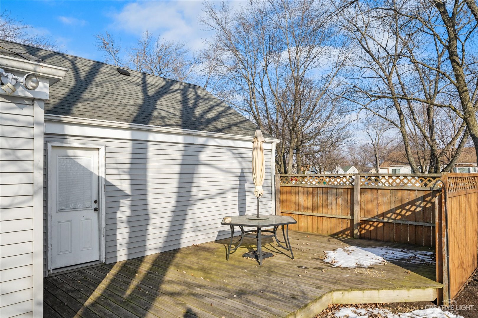 135 Heathgate Road Montgomery, IL 60538 - Photo 14 of 17 a view of balcony with wooden floor and seating space