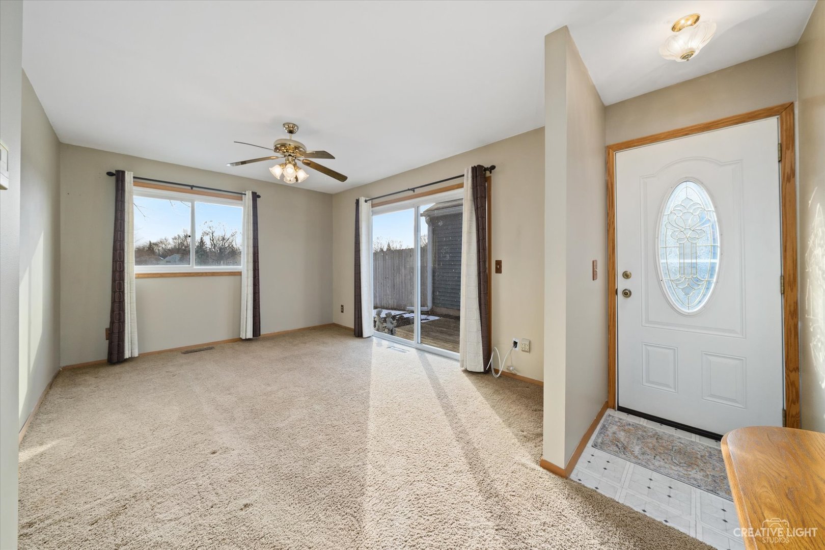 135 Heathgate Road Montgomery, IL 60538 - Photo 2 of 17 an empty room with windows and closet