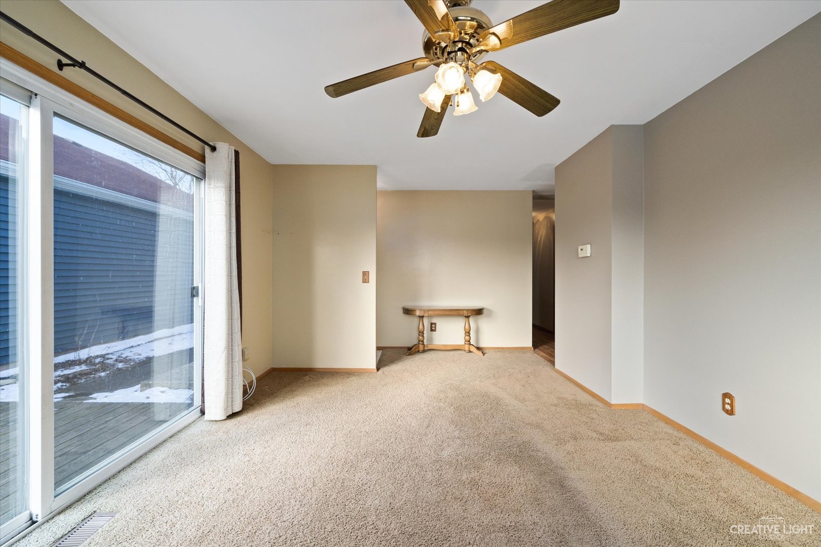 135 Heathgate Road Montgomery, IL 60538 - Photo 3 of 17 wooden floor and chandelier fan in a room