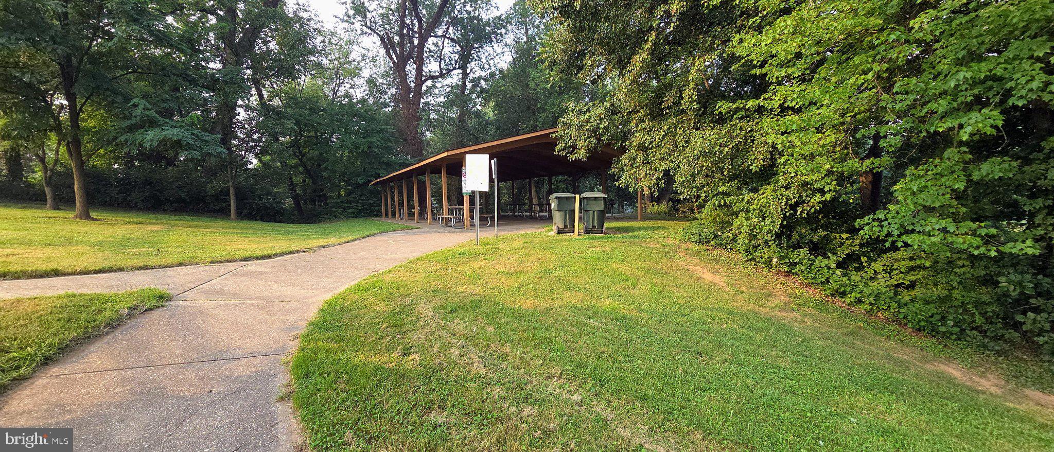 506 Pickwick Village Way Silver Spring, MD 20901 - Photo 17 of 31 Serene park pathway to a shelter.