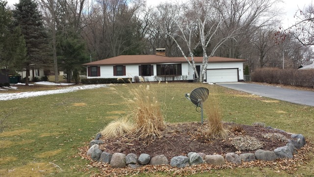535 North County Road Bloomfield, WI 53128 - Photo 14 of 25 a front view of a house with a yard