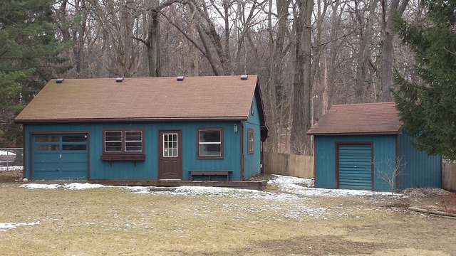 535 North County Road Bloomfield, WI 53128 - Photo 17 of 25 a front view of a house with a yard and garage
