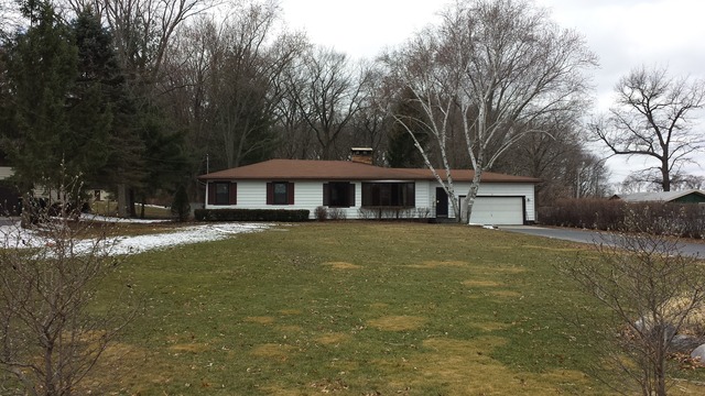 535 North County Road Bloomfield, WI 53128 - Photo 18 of 25 a front view of a house with a garden