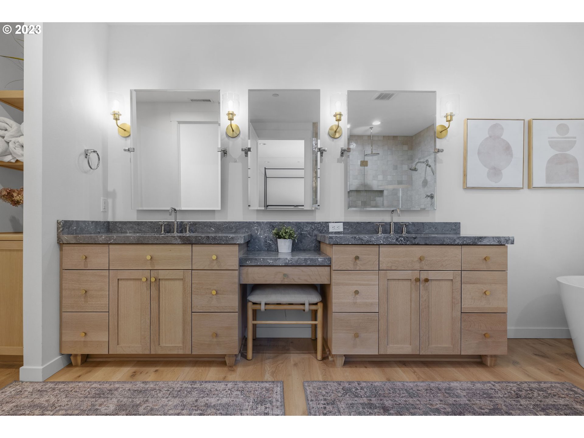 3410 Northwest McMaster Drive Camas, WA 98607 - Photo 24 of 43 a spacious bathroom with a granite countertop sink and a mirror