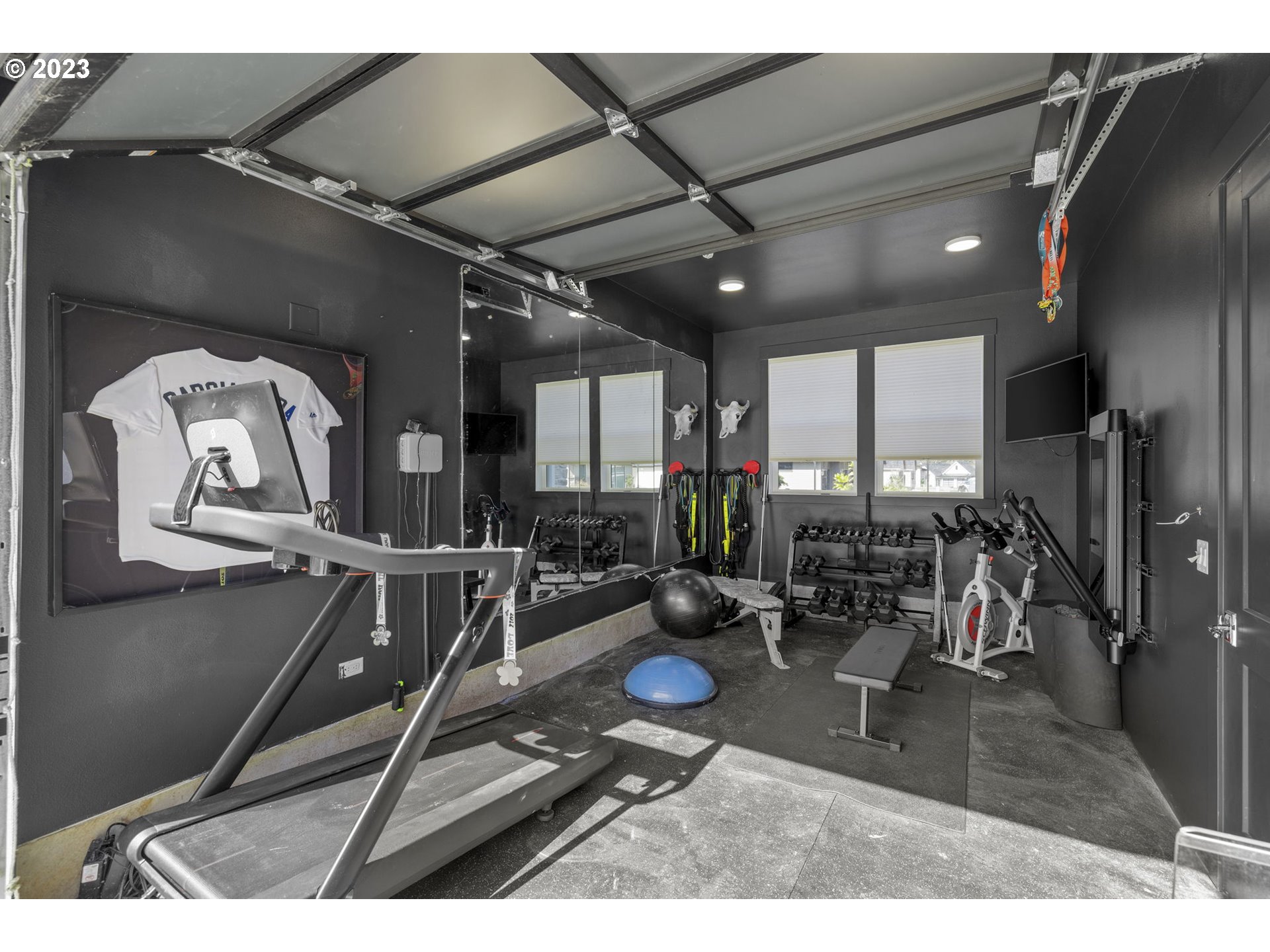 3410 Northwest McMaster Drive Camas, WA 98607 - Photo 33 of 43 a room with gym equipment and large window