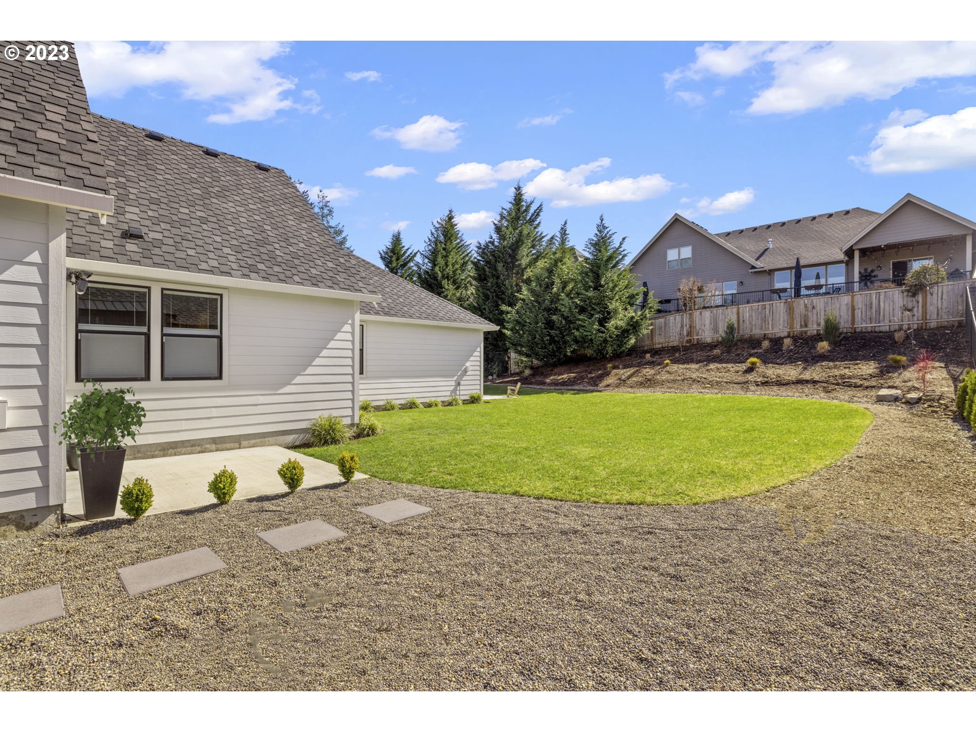 3410 Northwest McMaster Drive Camas, WA 98607 - Photo 42 of 43 a view of a house with swimming pool and a yard
