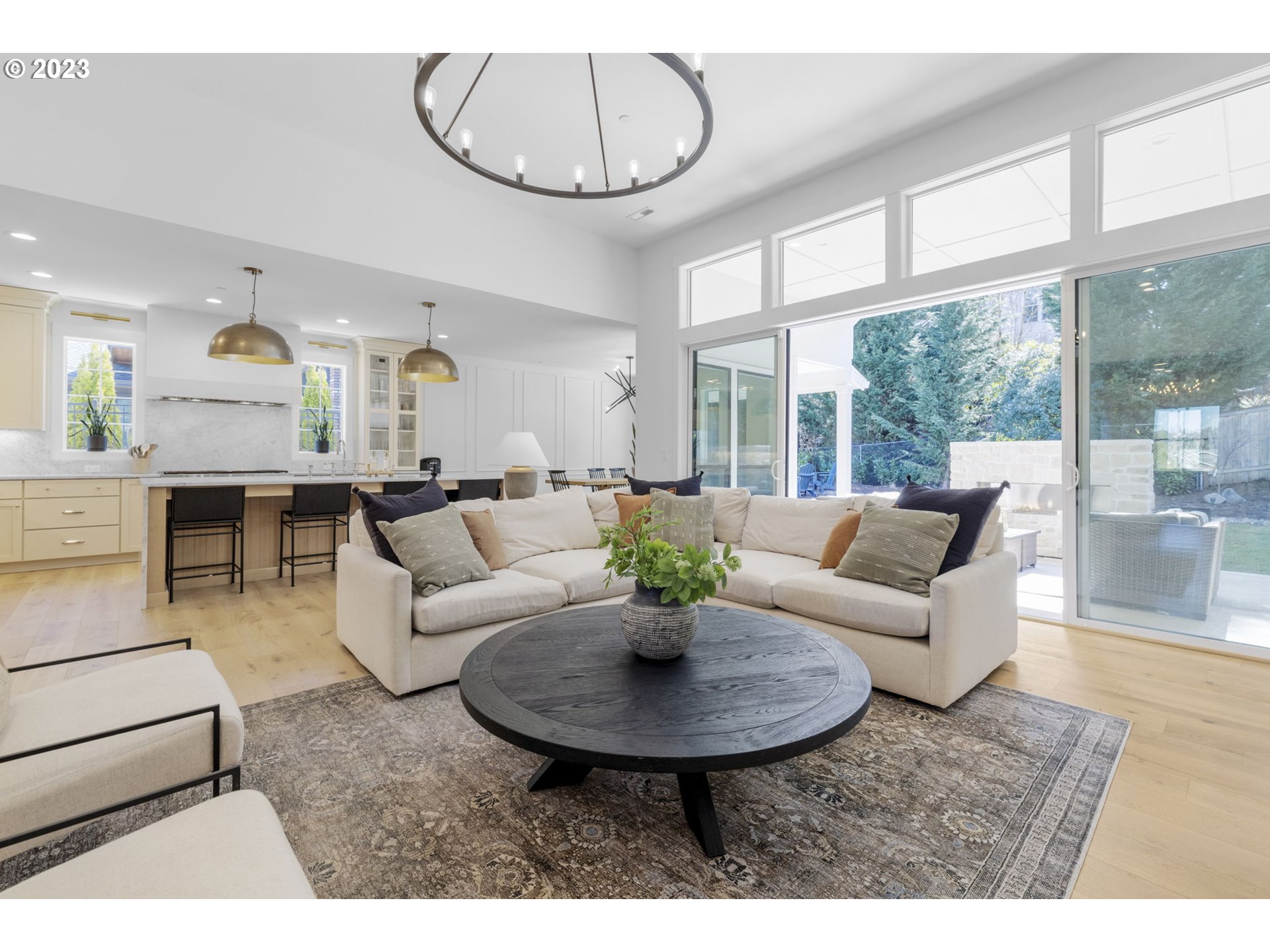 3410 Northwest McMaster Drive Camas, WA 98607 - Photo 9 of 43 a living room with furniture a table and a large window