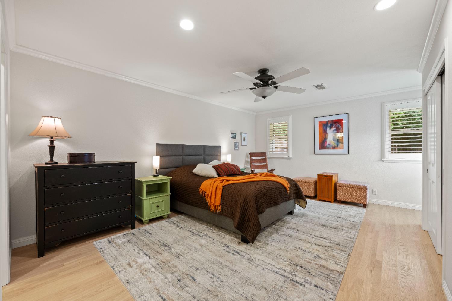 1325 Philomene Court Carmichael, CA 95608 - Photo 21 of 40 a bedroom with a bed and a chandelier