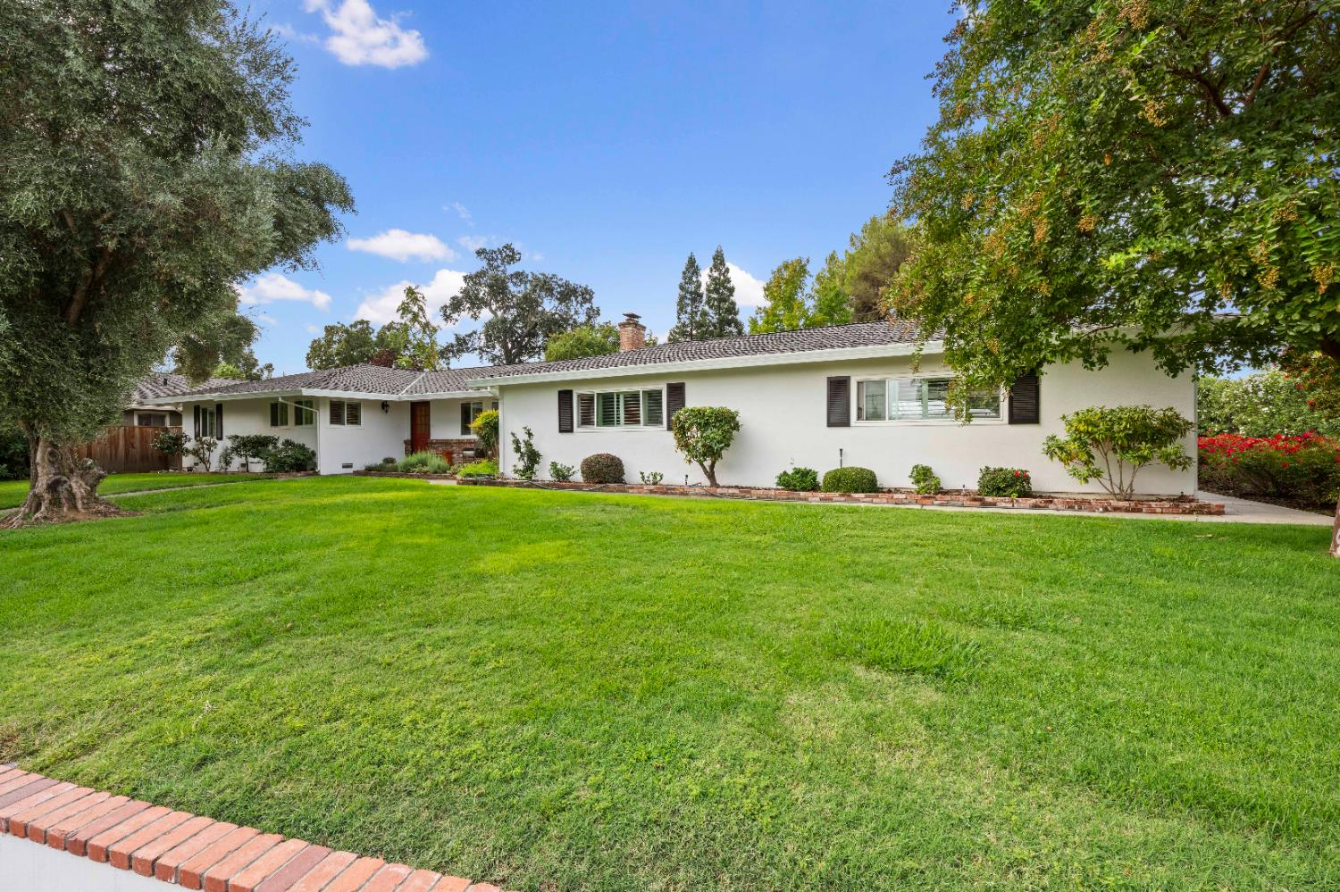 1325 Philomene Court Carmichael, CA 95608 - Photo 4 of 40 a view of a house with backyard sitting area and garden