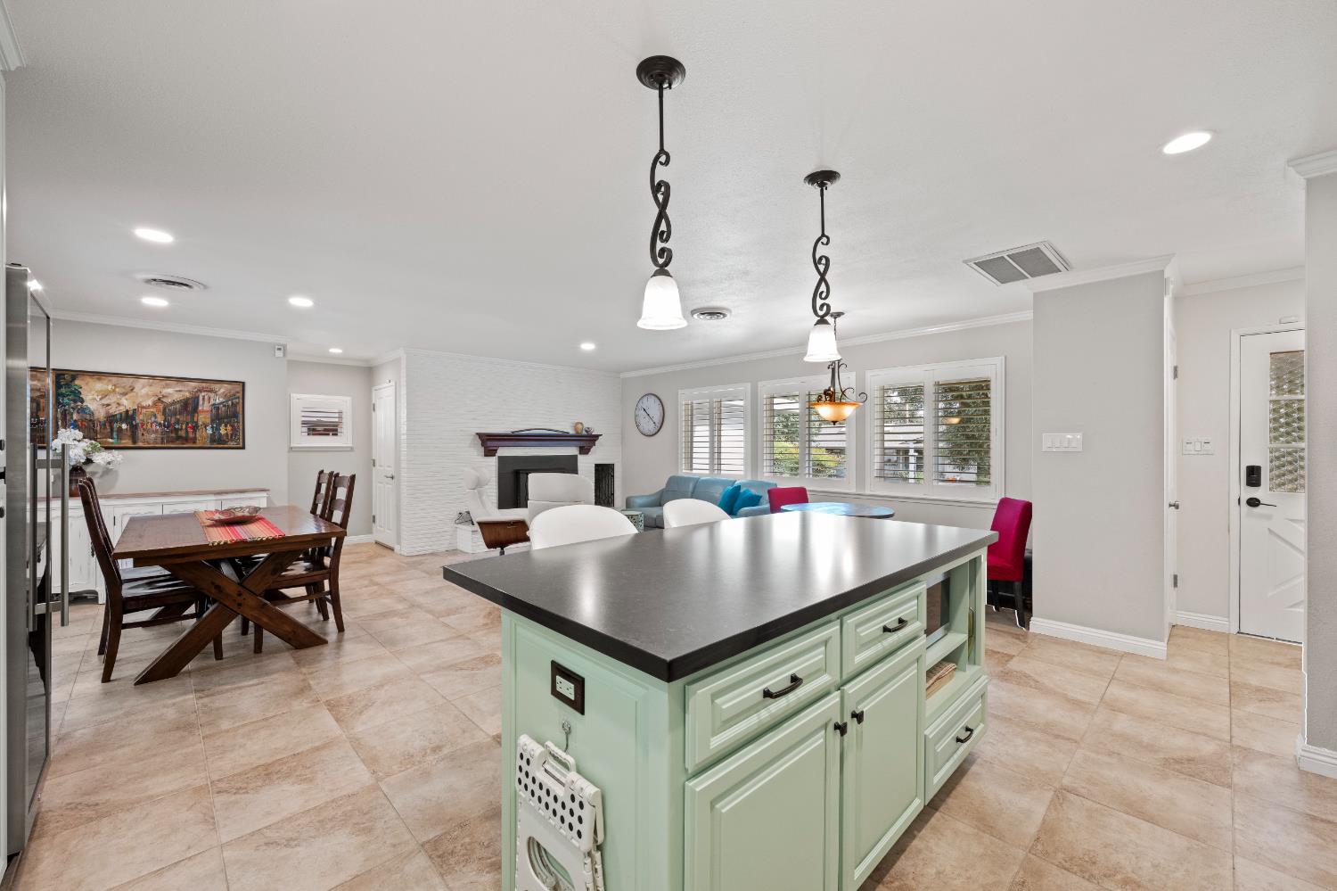 1325 Philomene Court Carmichael, CA 95608 - Photo 8 of 40 a kitchen that has a lot of cabinets in it