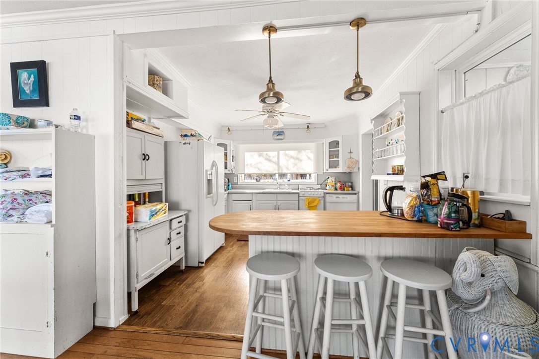 90 Deep Harbor Road Lancaster, VA 22503 - Photo 12 of 21 a view of a kitchen and dining room
