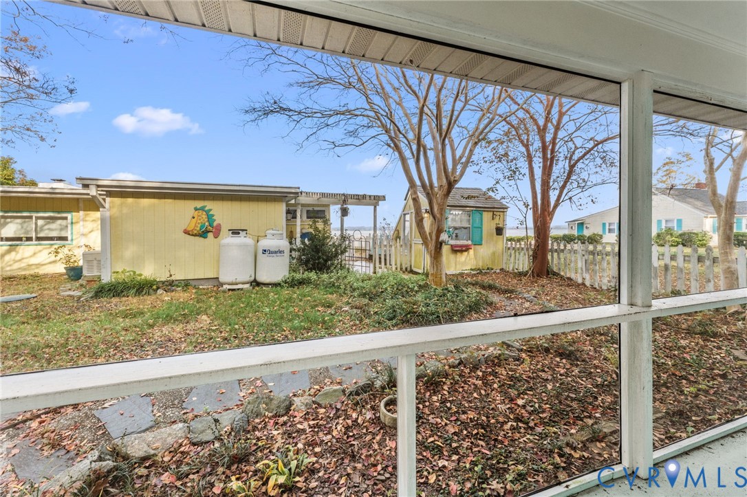 90 Deep Harbor Road Lancaster, VA 22503 - Photo 18 of 21 a view of a house with a yard