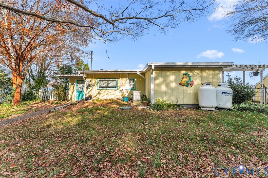 90 Deep Harbor Road Lancaster, VA 22503 - Photo 3 of 21 a view of back yard of the house