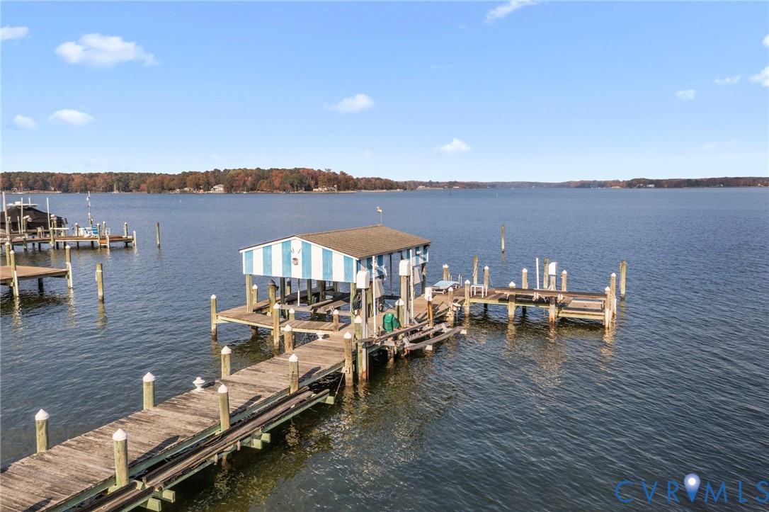 90 Deep Harbor Road Lancaster, VA 22503 - Photo 4 of 21 a view of a terrace with chairs