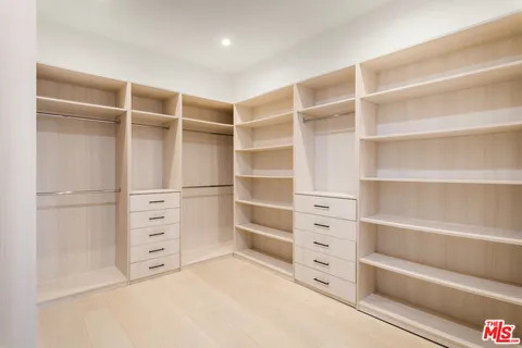 a living room with fireplace furniture and a flat screen tv