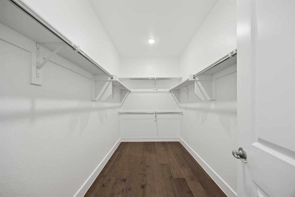 1317 Benjamin Trail Van Alstyne, TX 75495 - Photo 14 of 29 a view of a room with racks on the wall